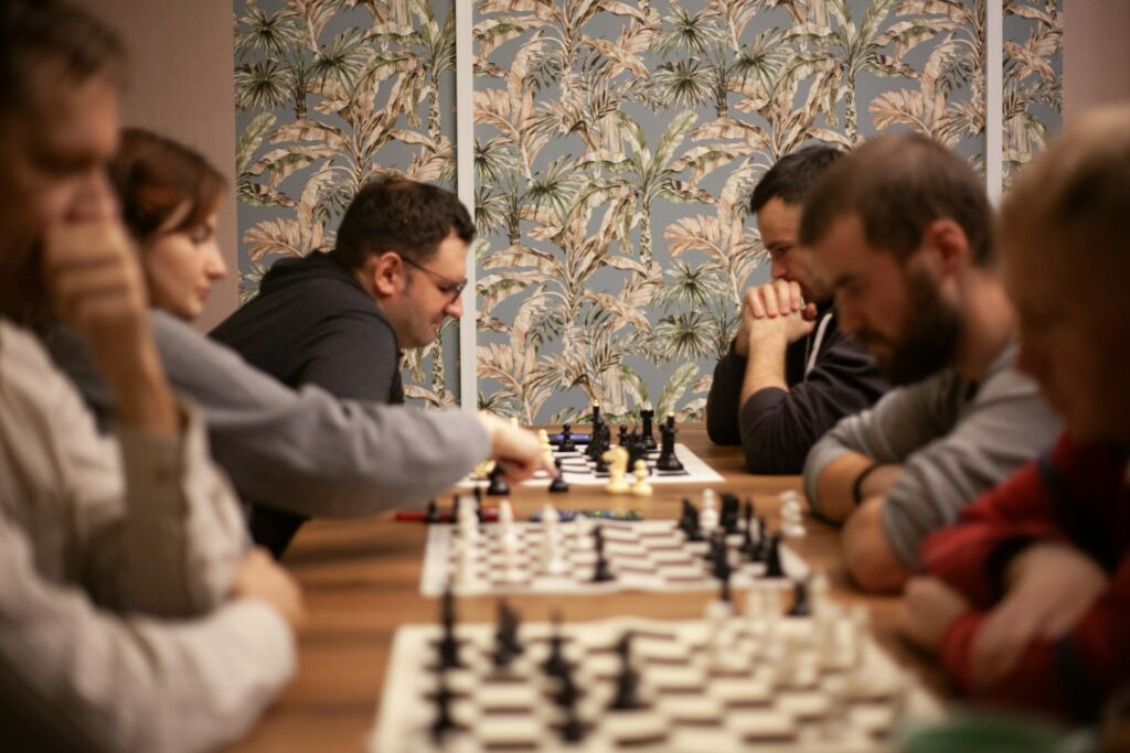 Several chess games happening at a tournament
