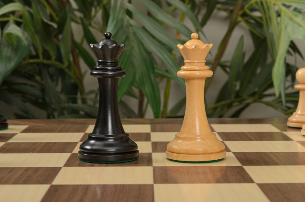 White and Black Chess Queens face off