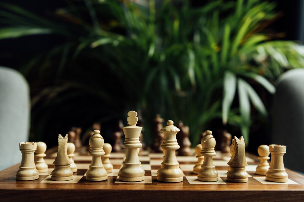 Close-up of a chessboard with all pieces in their starting positions