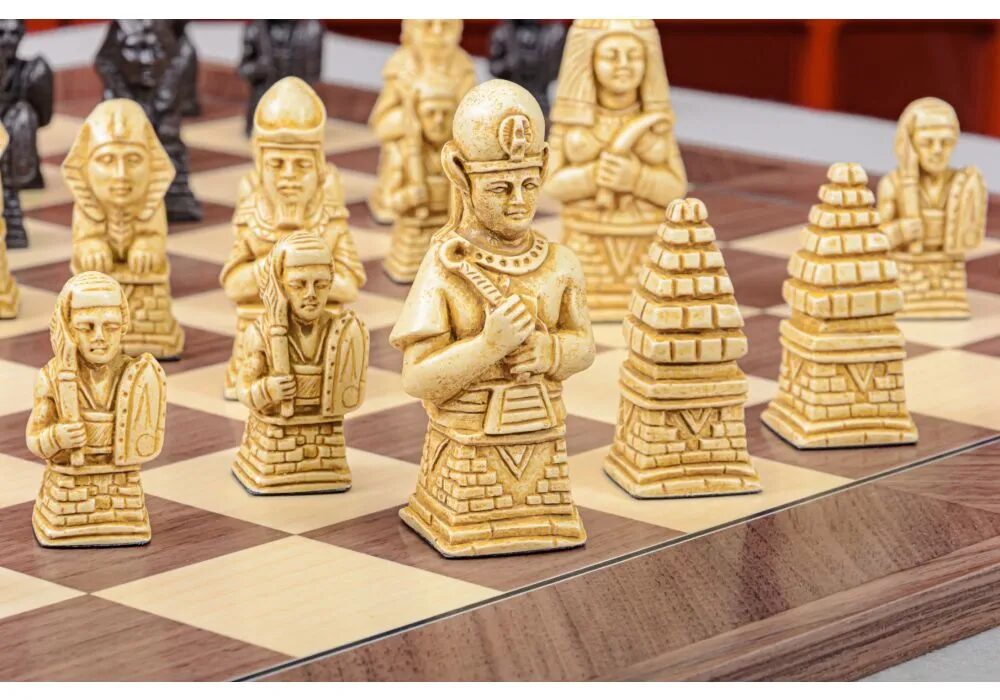 Close-up of an Egyptian-themed chess set with intricately designed pieces