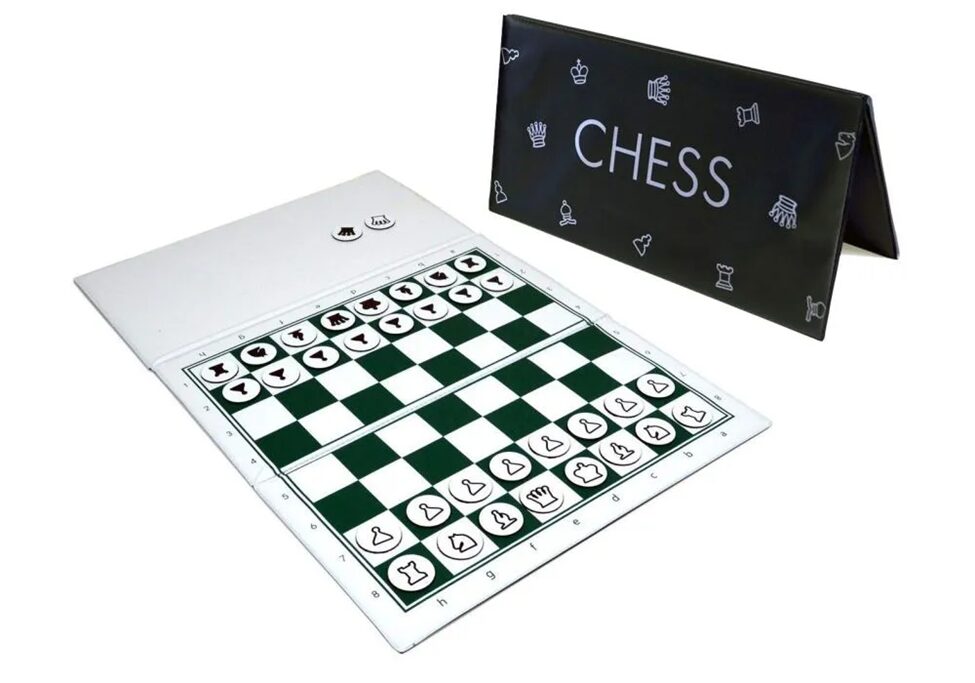 Magnetic travel chess set with a green and white board and black case, for portable and on-the-go gameplay